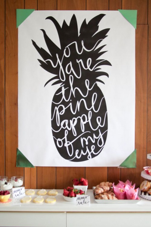 a graphic pineapple artwork will accent your dessert table or any other space in your tropical wedding venue