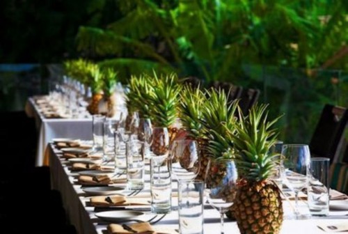 a pineapple table runner is ideal for a tropical wedding tablescape, it's very easy to recreate
