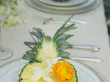 pineapples with blooms as a tropical wedding appetizer are perfect to embrace the location