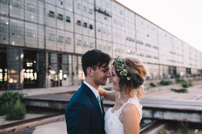 Picture Of industrial warehouse wedding with green touches  14