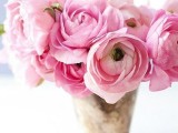 a refined vase with pink blooms is a timeless and chic Valentine’s Day wedding centerpiece to rock