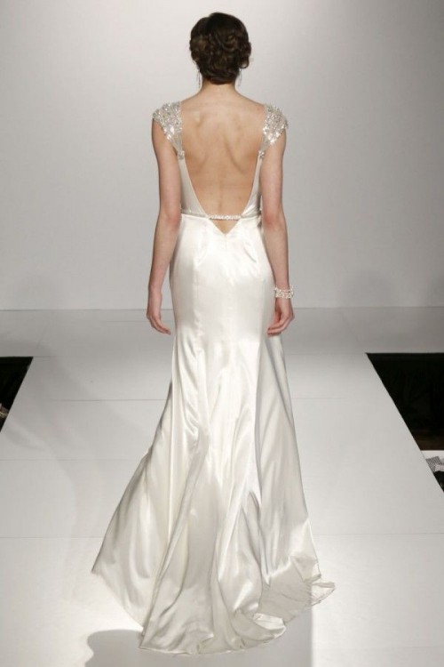 a refined plain mermaid wedding dress with embellished shoulders and a sash and an open back plus a small train is timeless beauty