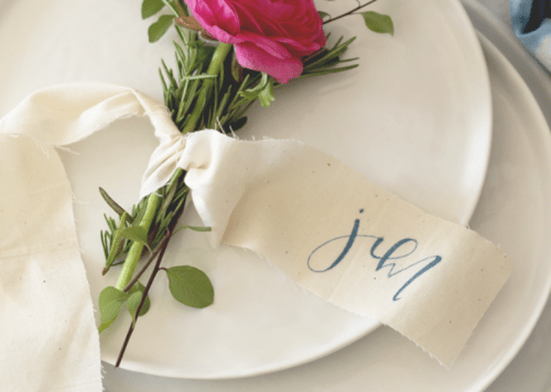 Lovely DIY Rosemary And Ranunculus Place Card Table Settings