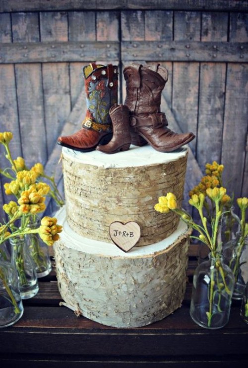a bark wedding cake with cowboy boots as toppers is a fun and whimsical rustic wedding dessert