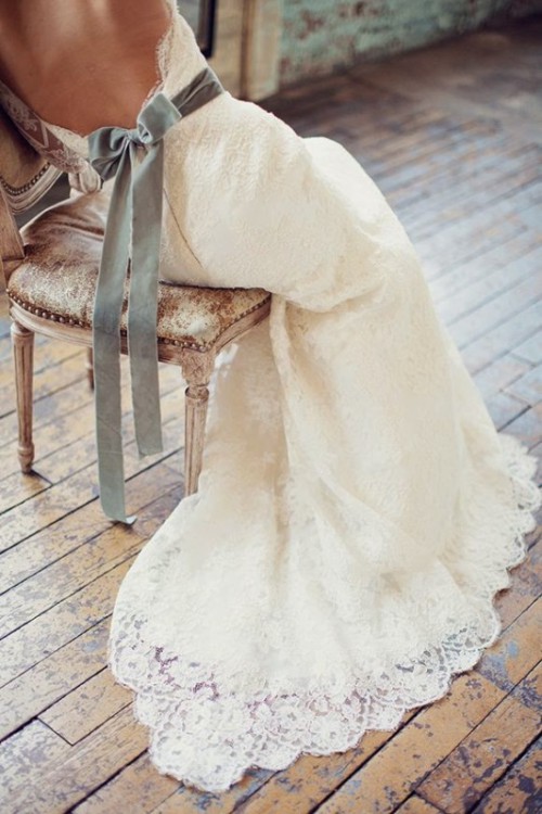 a super romantic lace wedding dress accented with a grey velvet ribbon sash is a beautiful idea that enchants with its refined look