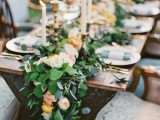 a lush greenery and pastel bloom garland is a very chic, tender and romantic idea
