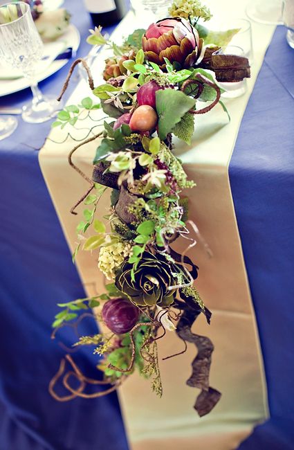 a textural greenery and veggie garland is a nice fit for a farmhouse or just rustic wedding
