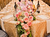 a greenery and pink bloom wedding table garland is a gorgeous idea for a refined and chic tablescape