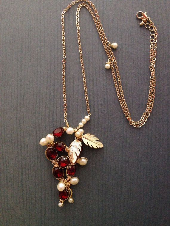 A refined necklace with pearls, gold leaves and marsala berry beads is a lovely and chic idea for a winter or fall bride