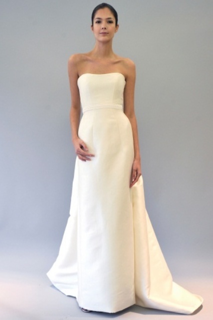 a strapless plain A-line wedding dress with a sash and a train is a cool idea for a modern romantic bride