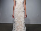 a nude lace A-line wedding dress with an illusion neckline, no sleeves and a small train for a romantic look