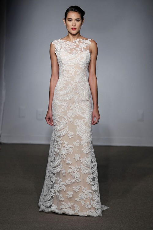 a nude lace A-line wedding dress with an illusion neckline, no sleeves and a small train for a romantic look