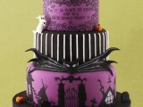 a black, purple and white Halloween wedding cake with unique patterns and quotes, sugar pumpkins and skulls and Sally and Jack Skellington toppers