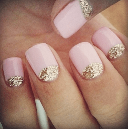a light pink moon wedding manicure with gold glitter is a lovely glam idea for a bride who wants to sparkle a bit