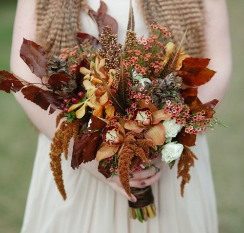 a catchy and lovely rust-colored fall woodland wedding bouquet with lots of texture is amazing for your fall wedding
