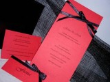 red wedding stationary with black bows is a timeless combo with an elegant feel