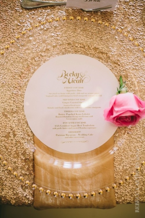 a gold sequin tablecloth, a sheer placemat and a pink rose for wedding tablescapes