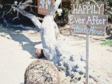 vine balls, driftwood, simple wooden signs and family photos on the tree