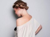a twisted low updo on medium hair, with black ribbon interwoven is a cool idea for a romantic feel in the look