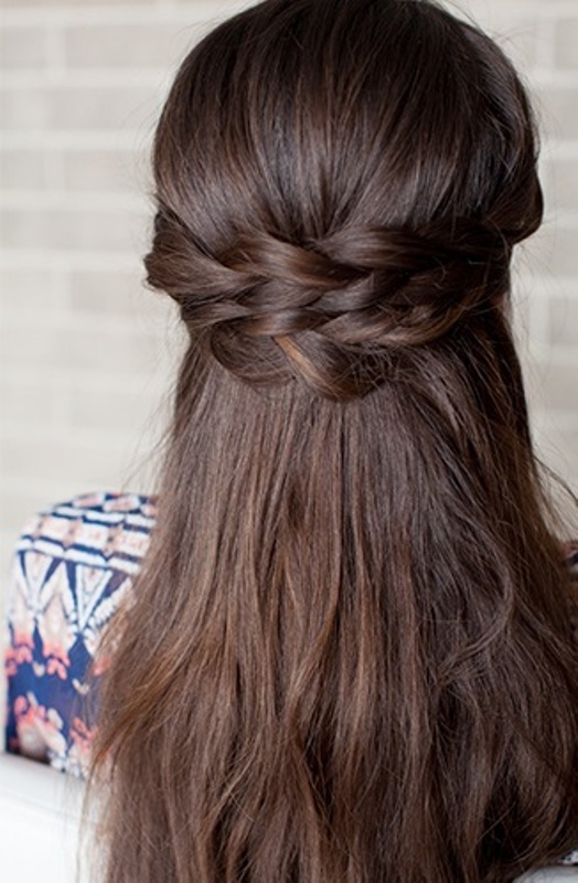 Picture Of romantic diy braided half up bridal hairstyle  5