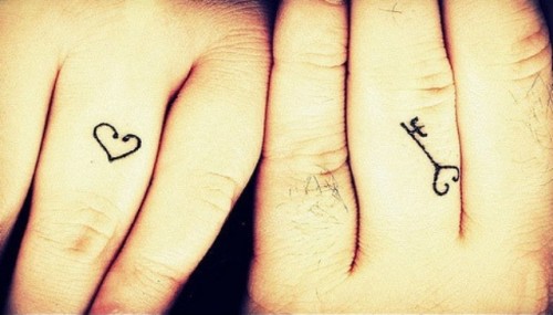 a little heart and key tattoo on the ring finger are lovely and cute to rock instead of wedding rings