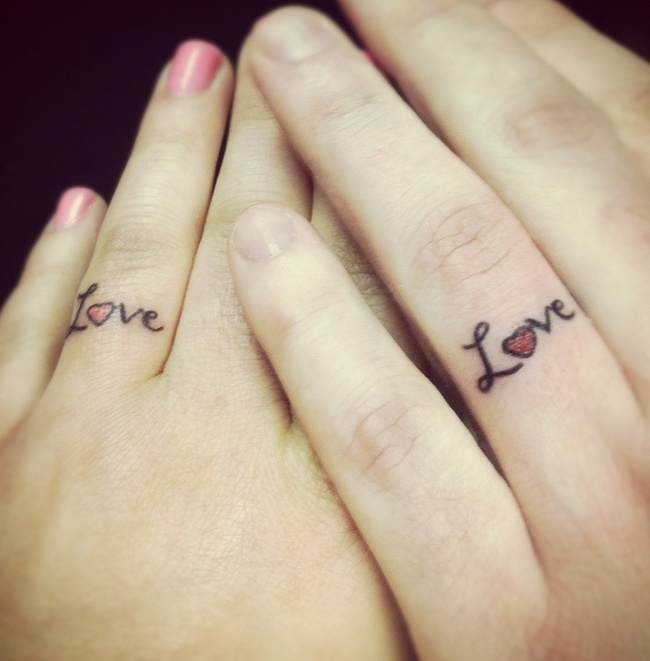 Pretty LOVE and red heart ring like tattoos on ring figers are lovely and fun and look very cute