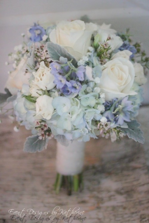 a delicate wedding bouquet of white, pale blue and purple blooms plus pale foliage is a beautiful idea for a vintage-inspired bride