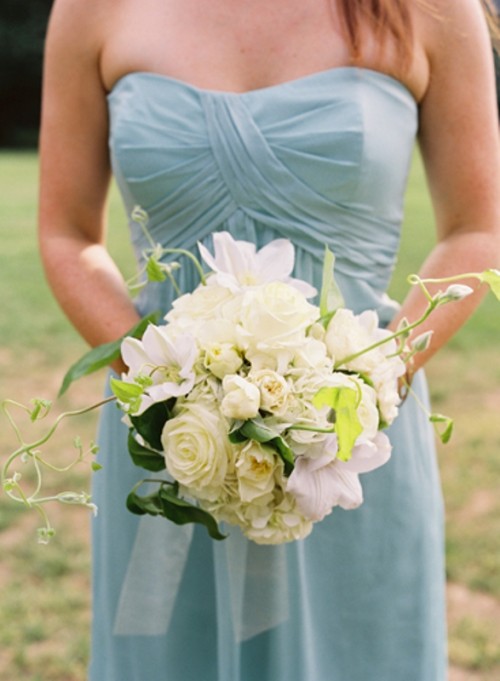 a pale blue strapless bridesmaid dress with a draped bodice is a lovely idea for a spring or summer wedding