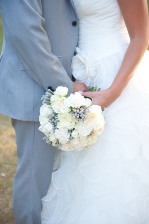 a pale blue groom's suit is a lovely idea for a beach, coastal and many other weddings, too