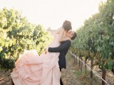 a pink strapless wedding dress with a layered skirt that imitates a flower is a veyr cute and girlish idea