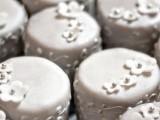 silver patterns mini cakes plus white sugar flowers with beads are amazing for a frozen winter wedding