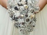 a sparkling cascading silver brooch wedding bouquet is a unique and bold idea for a winter bride, and such a bouquet will last long