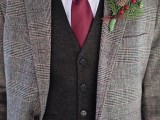 a stylish winter wedding boutonniere with a pinecone, berries and greenery is awesome to accent a groom’s look