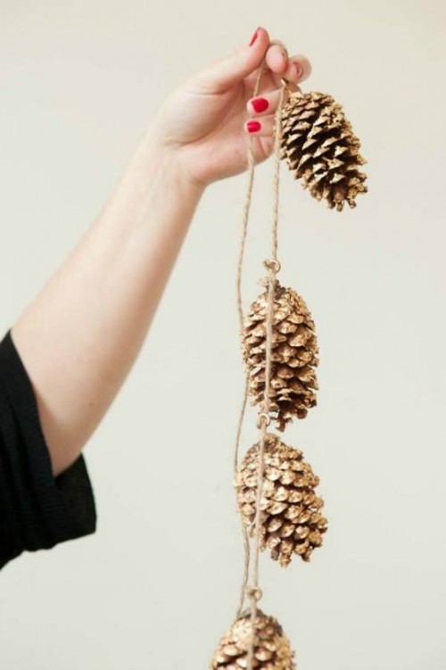 garlands of gilded pinecones are great for accenting any fall or winter wedding space