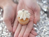 a mini cupcake with silver edible beads is a cool confection piece for a glam or NYE wedding