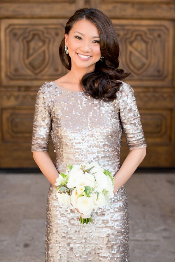 A rose gold sequin sheath wedding dress with a high neckline and long sleeves is a simple and very glam idea for your wedding