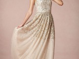 a strapless blush A-line wedding dress with gold sparkles is a chic and beautiful idea with a romantic twist