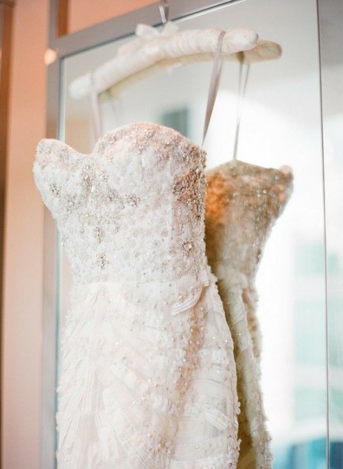 a beautiful ivory strapless embellished sheath wedding dress is a glam and chic idea to rock