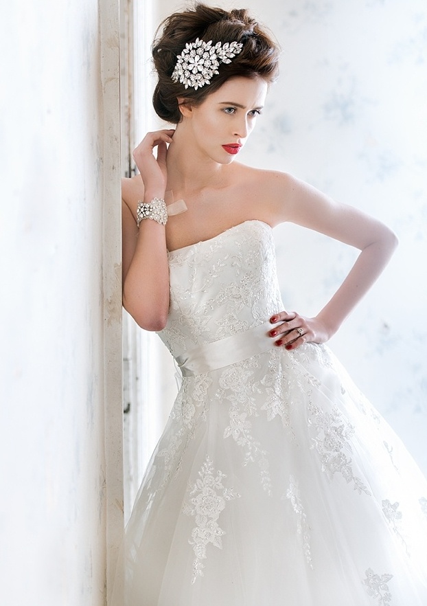 A strapless lace embellished wedding ballgown is a refined and gorgeous option for a NYE bride