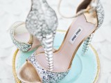 silver glitter wedding shoes with ankle straps and glam embellished heels are amazing for a chic and lovely bridal look with a touch of glam