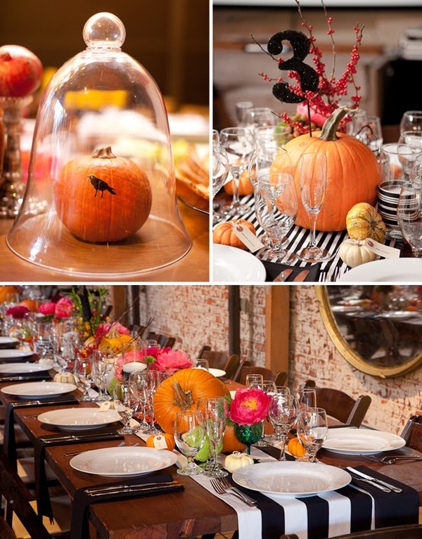 A stylish and bold Halloween wedding tablescape with a striped table runner, pumpkins, a glitter table number and some branches plus bright blooms