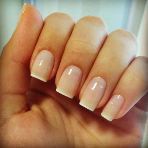 a fresh take on classic French nails - a French manicure with straight white tips is a modern solution