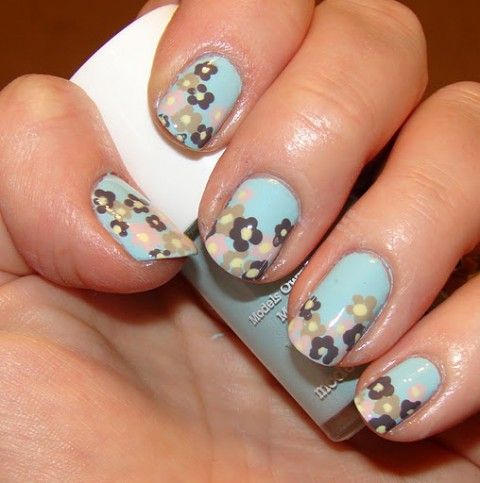 mint blue nails with delicate pastel and grey florals painted on them for a flower-filled wedding in spring or summer