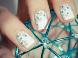 a white manicure with pastel and muted color polka dots is a lovely idea for a spring or summer wedding