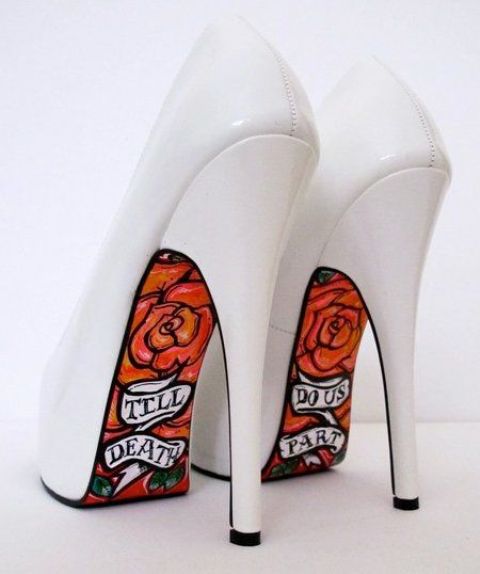 white shoes with bold graffiti on the soles is a creative touch to the bridal look and these soles won't be seen all the time