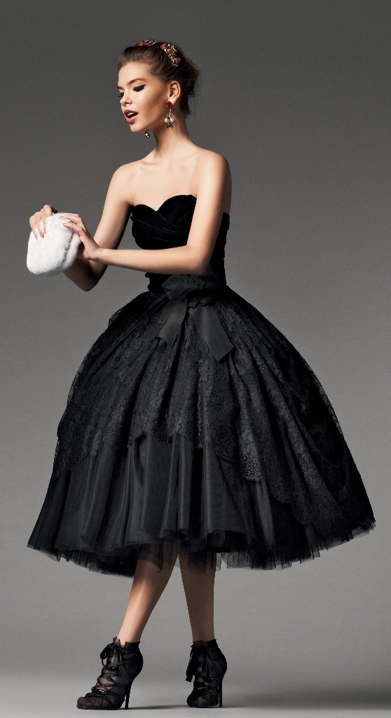 A black lace strapless midi ballgown with a layered skirt plus black lace up shoes for a soft glam Halloween look
