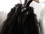 a black and white wedding ballgown with a corset, cap sleeves and tiers of tulle is a striking idea for a Halloween bride