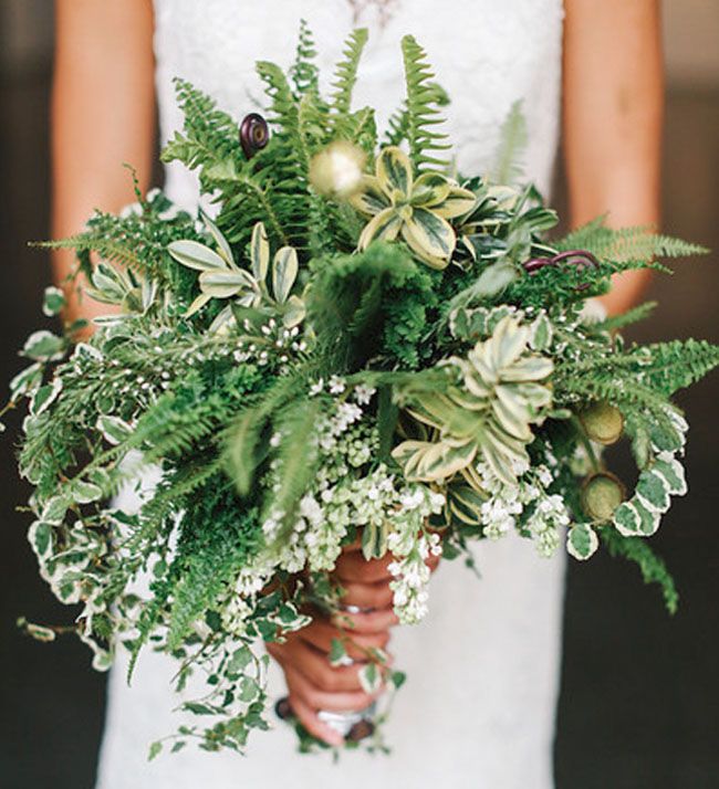 A greenery wedding bouquet composed only of foliage and greenery is a pretty and cool idea for a woodland wedding