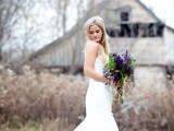 a plain mermaid wedding dress on straps with a train is a great idea for a modern barn bride