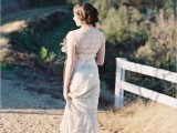 an off-white full lace fitting wedding dress with cap sleeves is a stylish vintage idea to try